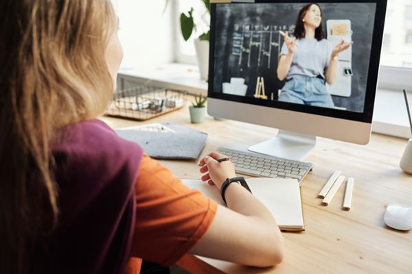 Online 1-on-1 tutoring stock image of a girl studying. 